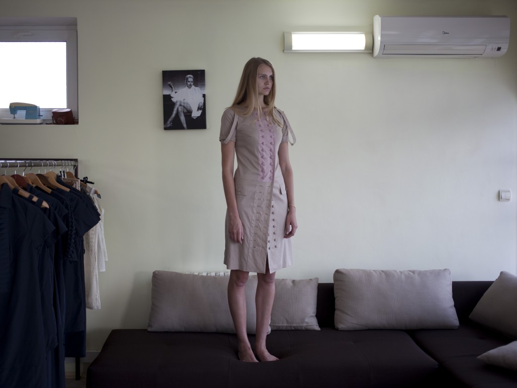 A model is photographed in the studio of Sevastopol fashion designer Lyudmila Komardina. Crimea 07.08.14